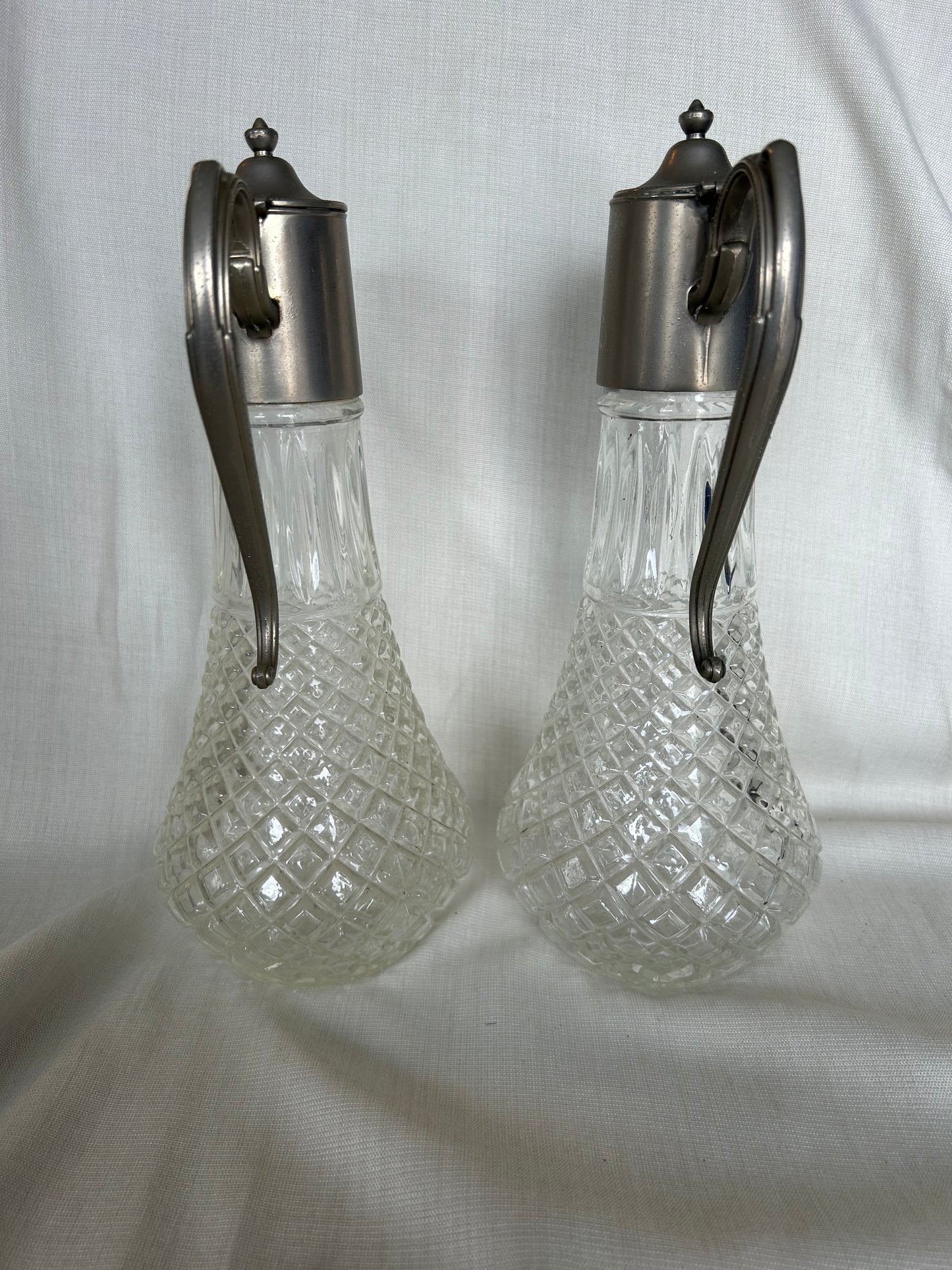 Pair of Antique E.P. Zinc Silver Plated Crystal Decanters